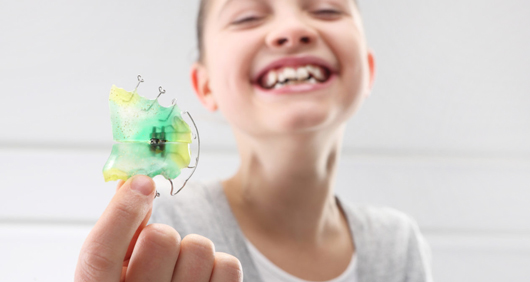 Stock Image of Model Showing her Dental Clip