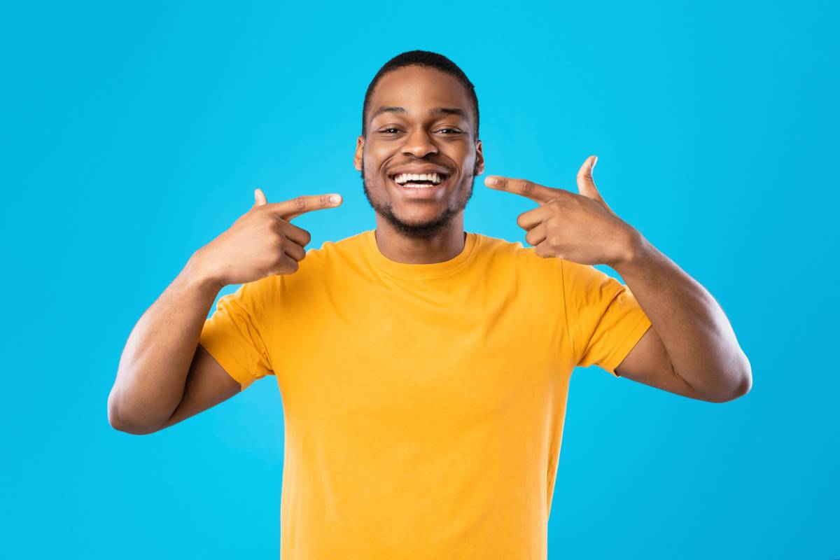 concept image of man smiling after braces